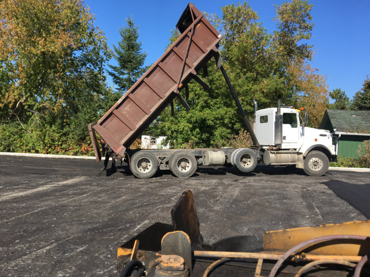 just finished dumping asphalt at a commercial job site