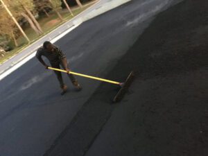 smoothing out the asphalt at a commercial property