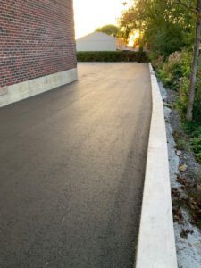 freshly paved commercial laneway