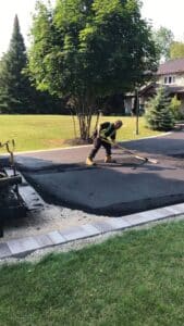 Residential driveway paved in asphalt in Mono