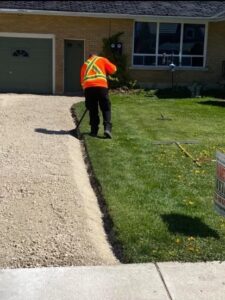 Residential gravel driveway getting prepped in Arthur